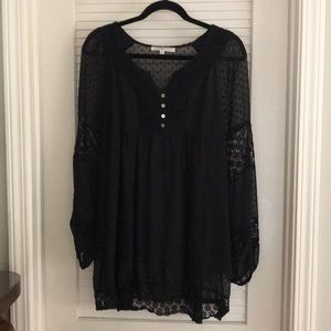 Black sheer patterned top.